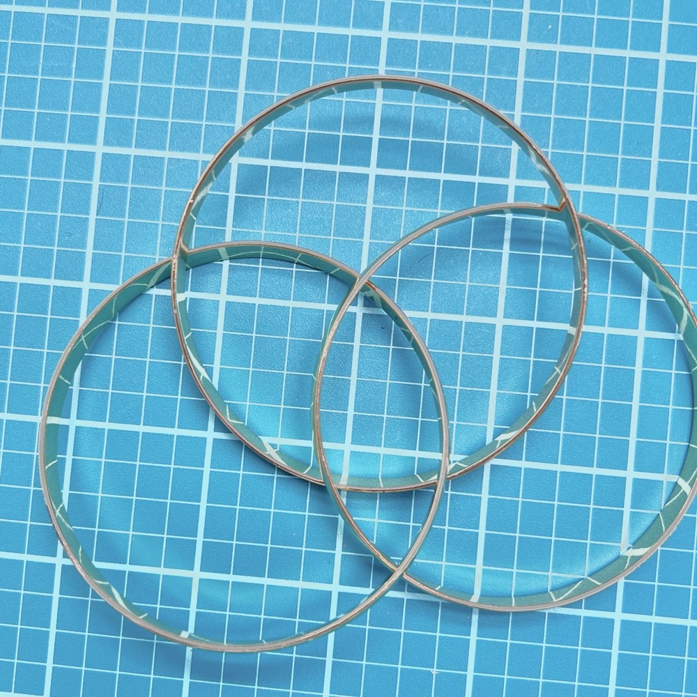 Gold Tone Trinity Interlocking Bangle - Picture 6 of 6